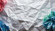 crumpled paper background, a close up of a multicolored piece of paper, an abstract sculpture