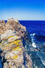 Canvas Print - Rocks by the sea a beautiful summer day