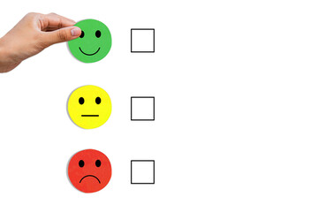 Emotion face symbol on Green, yellow and red wooden blocks, Consumers Show Satisfaction Rating concept by evaluating business success. Services and products and Customer Engagement, Quality Assessment