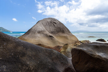 Wall Mural - Coastal rocks at Beau Vallon beach, Seychelles. Natural landscape photo