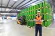 © industrieblick - group of workers in the logistics industry work in a warehouse with chemicals