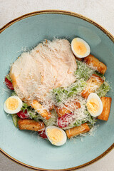Wall Mural - Portion of gourmet caesar salad with chicken