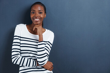 Wall Mural - Portrait, thinking and smile with black woman, ideas and decision on a grey studio background. Face, African person and model with mockup space and girl with planning and wonder with problem solving