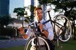 Morning, businessman and bicycle for sustainable travel, transportation and carbon footprint in city. Professional, commute and male employee walking with bike for cycling, journey or eco friendly