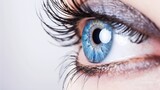 Fototapeta  - human eye with blue iris, vision care concept, Blue woman eye macro
