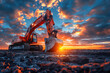 An excavator performs excavation work in a sand quarry against the backdrop of the sunset sky.