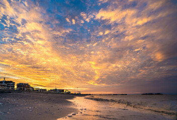 Wall Mural - Sunset on the Rimini beach, Italy