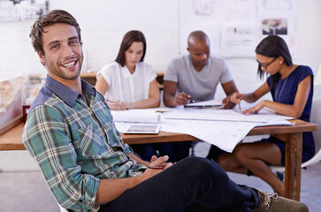 Poster - Happy man, creative and portrait with team for meeting, planning or architectural design at office. Employee or architect with smile, documents or paperwork in group project or startup at workplace