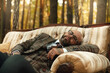 Man Sleeping In A couch In The Forrest