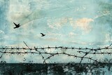 Fototapeta  - Barbed wire fence, birds flying in the background against a clear blue sky. Concept of the hope of freedom.