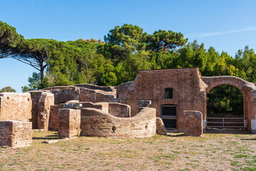 Wall Mural - Ruins of ancient roman town at archaeological park in the italian city of Ostia