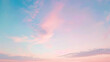 Pastel Sunrise Sky with Delicate Clouds
