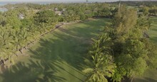 Aerial View Of Beautiful Golf Course With Greenery, Palm Trees And Luxury Resort, Pointe De Flacq, Mauritius.
