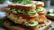 Healthy homemade red fish sandwich with cucumbers and scramble in cream sauce. Generative AI.