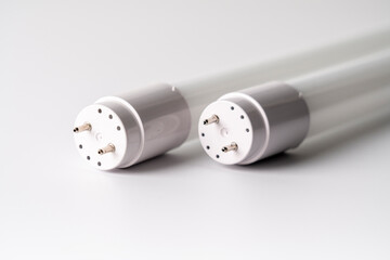 white led tubes on white background