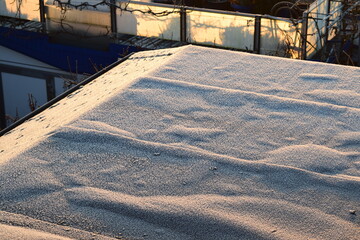 Wall Mural - white ice on a roof