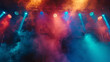 © Balqees - An atmospheric shot of the stage at a concert party, with smoke machines creating a haze of mist and colorful spotlights casting dramatic shadows,
