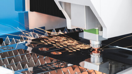 Poster - industrial machine laser cutting metal sheets at work, industrial concept background