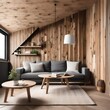 Corner sofa and rustic coffee table against wood lining wall with book shelves. Scandinavian home interior design of modern living room in attic.