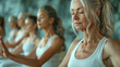 © Iuliia Metkalova - Seniors doing yoga pilates exercises outdoor, gym in background. Yoga class in the warrior pose. Students are women of mixed ages.  Healthy lifestyle and joyful elderly concept. Generative ai