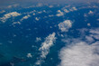 Sky view from the airplane window over Indonesia and ocean