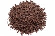 Pile scraped, milled dark chocolate shavings, 70 percent cocoa, isolated on white, top view