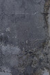 © Natalie JEFFCOTT/Stocksy - rough grey concrete texture