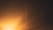 A Church Spire Against The Night Sky