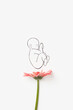© Yaroslav Danylchenko/Stocksy - Linear art of newborn baby on white background with pink gerbera