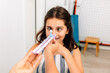 © VICTOR TORRES/Stocksy - Happy girl undergoing vision therapy test in clinic