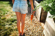 © Maria Manco/Stocksy - Child holds orange carrot