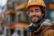 portrait smiling model male architect wearing hardhat and holding architectural plans, outside building in construction in the background, bokeh 