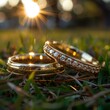 macro of wedding rings with high contrast on blurred grass background