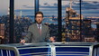 © stockbusters - Bearded anchor man talking at newscast multimedia channel closeup. Daily news