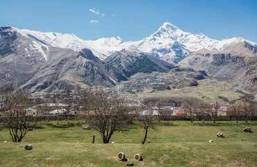 Poster - Mount Kazbek and Gergeti village seen from Stepantsminda, formerly Kazbegi in Mtskheta-Mtianeti region, Georgia