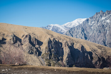 Canvas Print - Caucasus Mountains near Stepantsminda, formerly Kazbegi in Mtskheta-Mtianeti region, Georgia