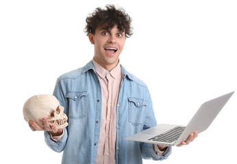 Poster - Happy male student with human skull and laptop on white background