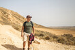 © Lupe Rodríguez/Stocksy - young man in the desert of bardenas reales