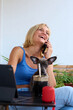 © Guille Faingold/Stocksy - Laugh during phone call