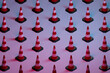 © Giada Canu/Stocksy - 3d pattern of many traffic cones