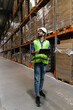 © Oleksii Syrotkin/Stocksy - Male foreign employee warehouse using tablet