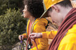 © Manu Prats/Stocksy - Diverse friends in activewear climbing outdoors