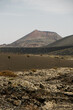 © Adrian Rodd/Stocksy - A volcanic crater on the distant horizon