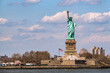 © David Prado/Stocksy - Iconic Statue of Liberty Overlooking Manhattan Waters