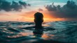The image captures a tranquil scene of a person submerged in sea water up to their neck, with the head facing away from the camera. They appear to be looking toward the horizon. The serene ocean surfa