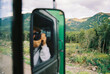 © Ivan Andrianov/Stocksy - Road Trip Photographer Car Self-portrait