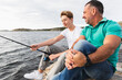 © Diego Martin/Stocksy - Father and son fishing