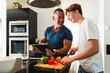 © Diego Martin/Stocksy - Cooking together
