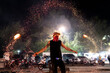 © Alvaro Lavin/Stocksy - Street performer in fire show