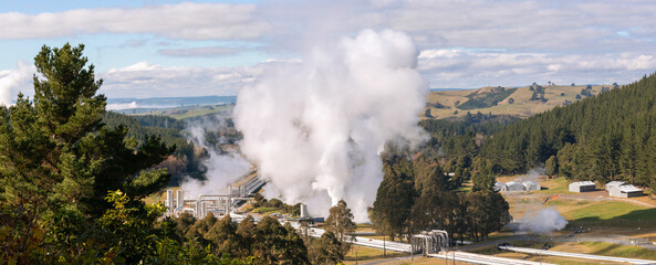 Wall Mural - Green energy geothermal power plant  steaming panorama